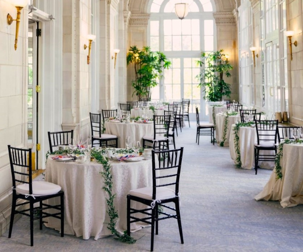 a room with tables and chairs