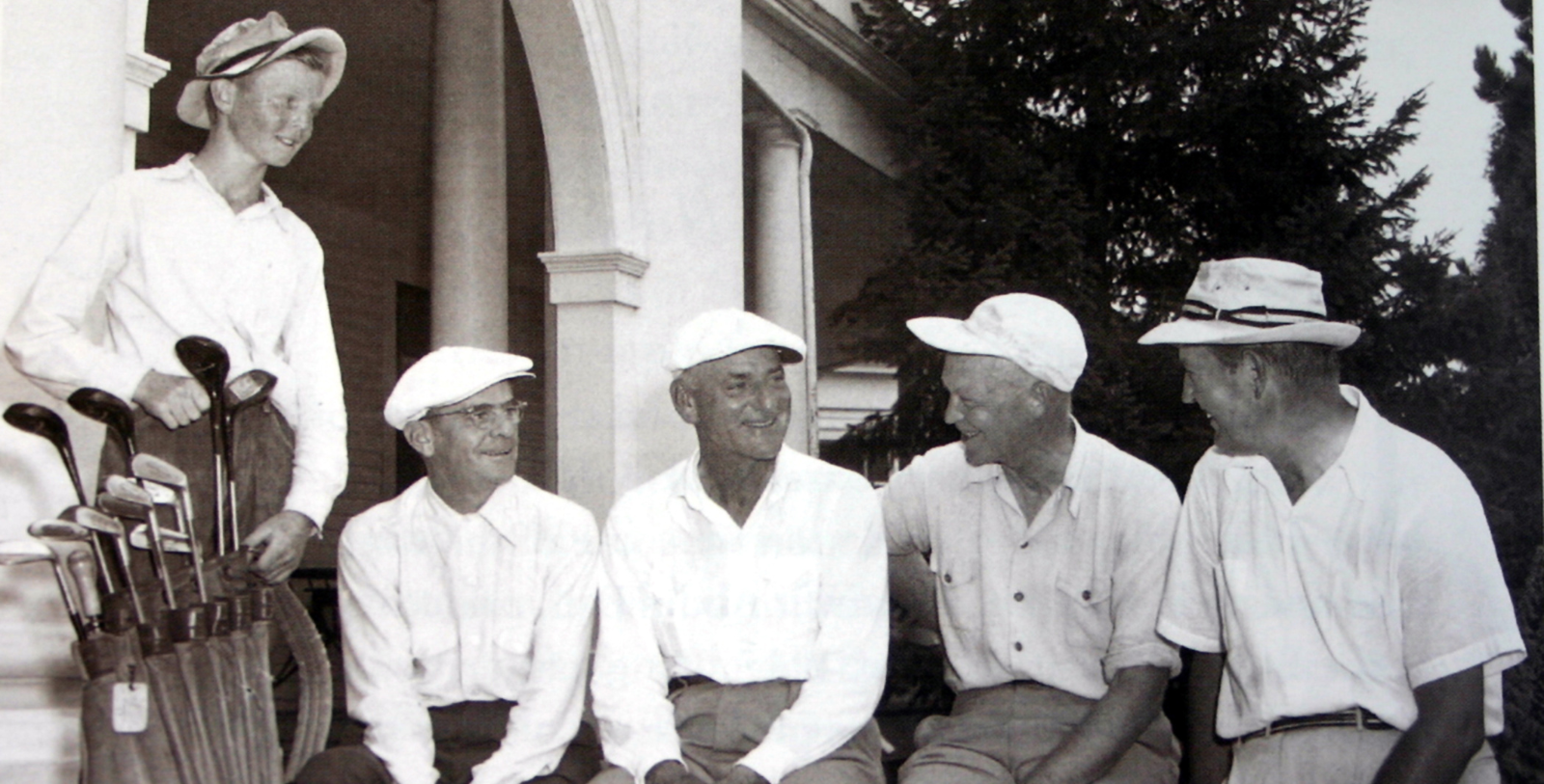 a group of men sitting together