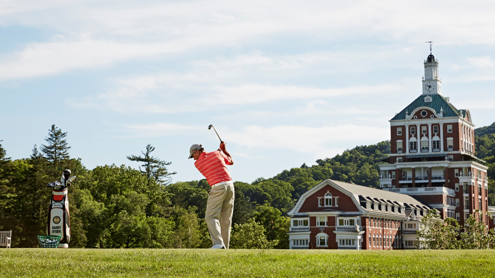 a man swinging a golf club