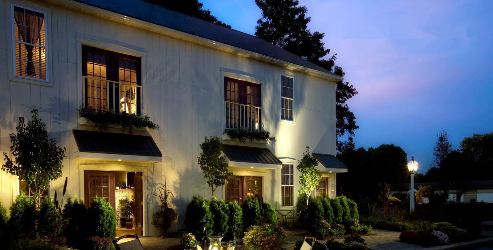 a house with a garden and trees