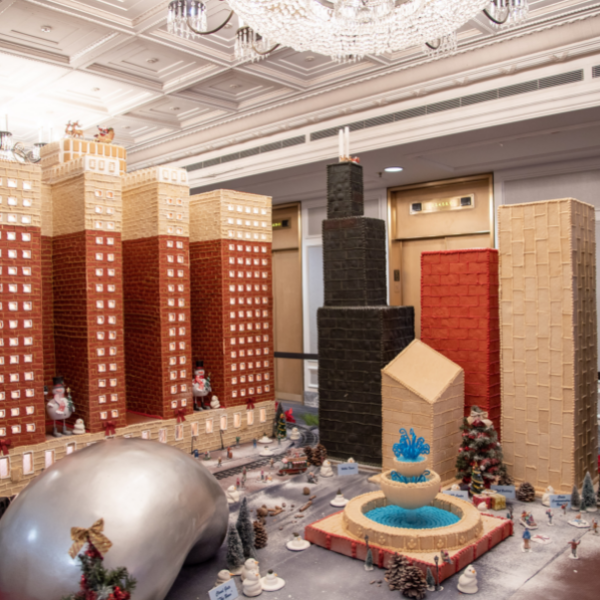a model of a city with buildings and a fountain