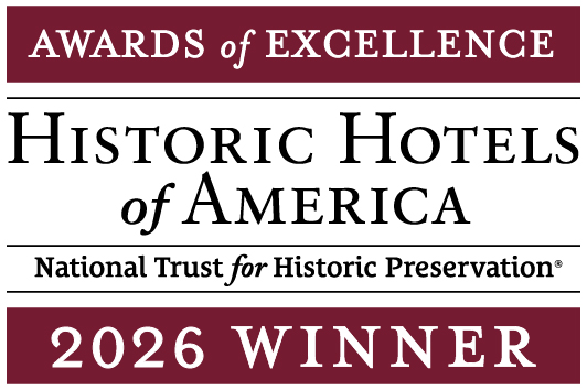 a red and white rectangular sign with black text