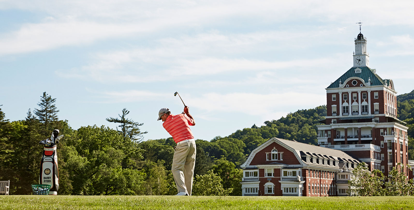 a man swinging a golf club