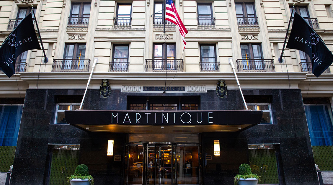 a building with a flag on the front