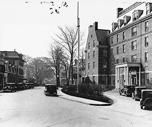 a street with cars and buildings
