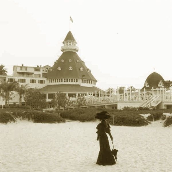 a woman walking on the beach