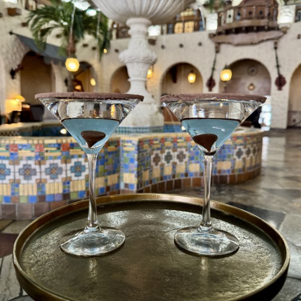 a group of martini glasses on a tray