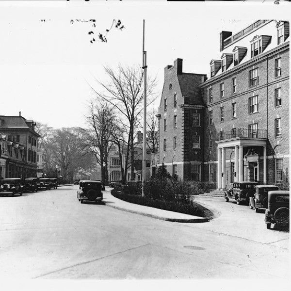 a street with cars and buildings