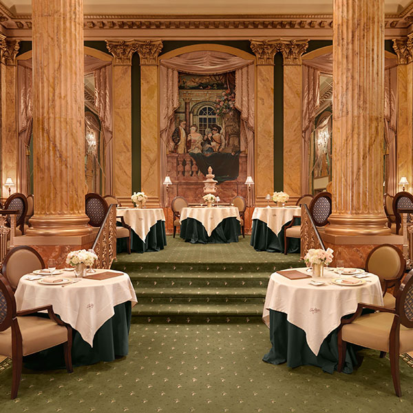 a restaurant with tables and chairs