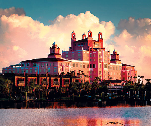 a large building next to a body of water