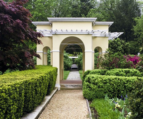 a path leading to a garden