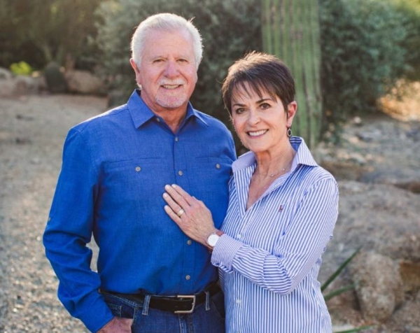 a man and woman standing together
