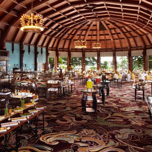 a large room with tables and food on it