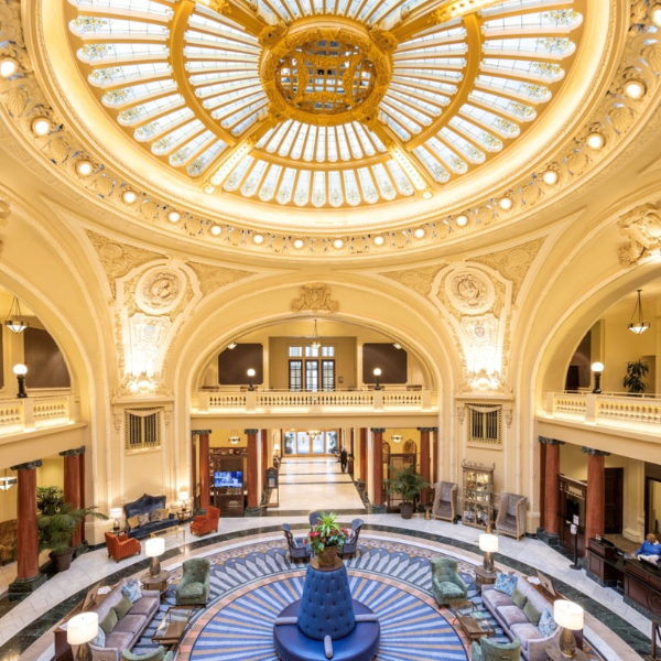a large circular building with a glass dome ceiling