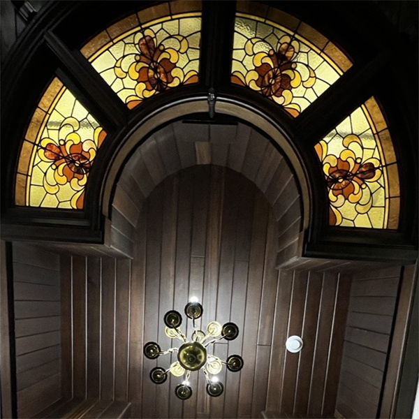 a stained glass window in a room