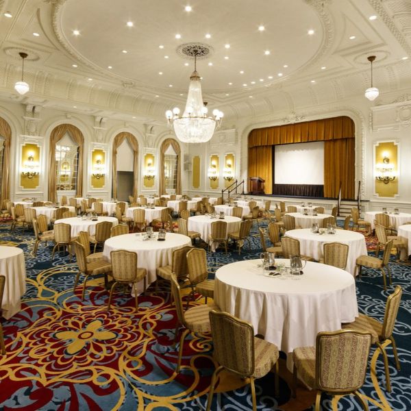 a room with tables and chairs