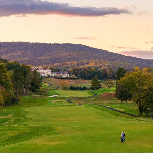 a man standing on a golf course
