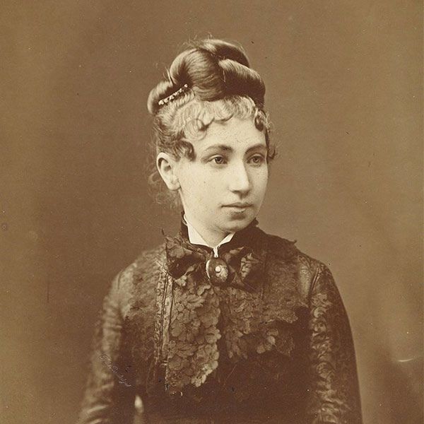 a woman in a black dress