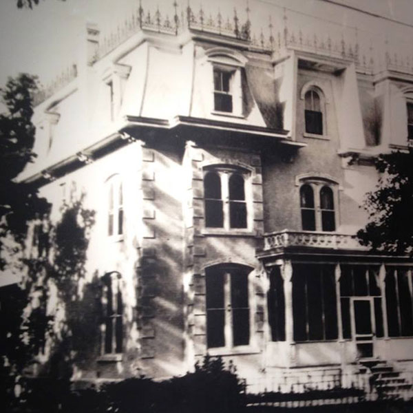 a black and white photo of a house