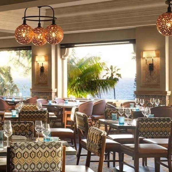 a restaurant with tables and chairs