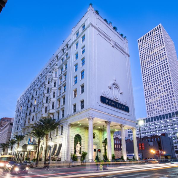 a white building with columns and columns