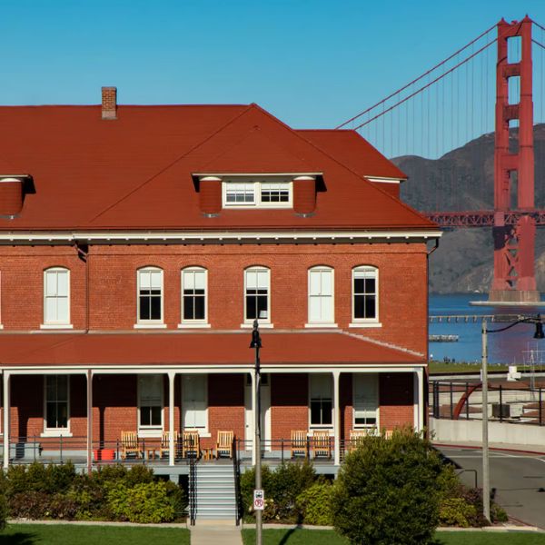 a building with a bridge in the background