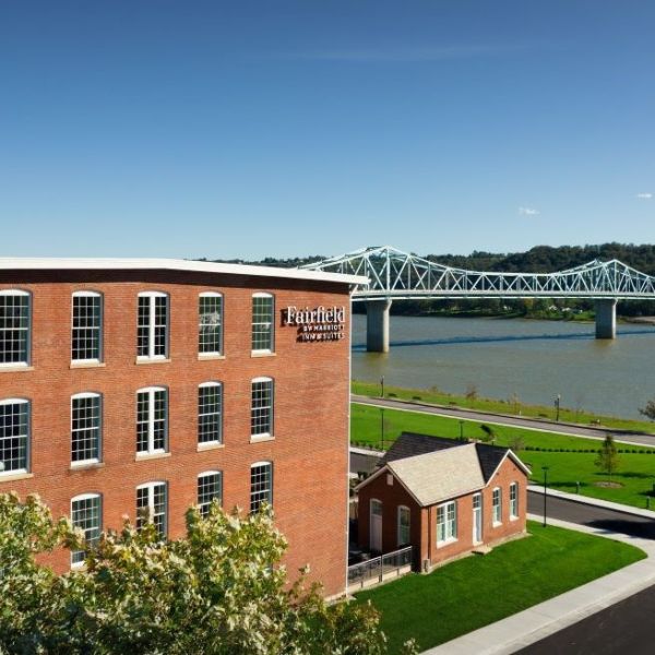 a building with a bridge over the water