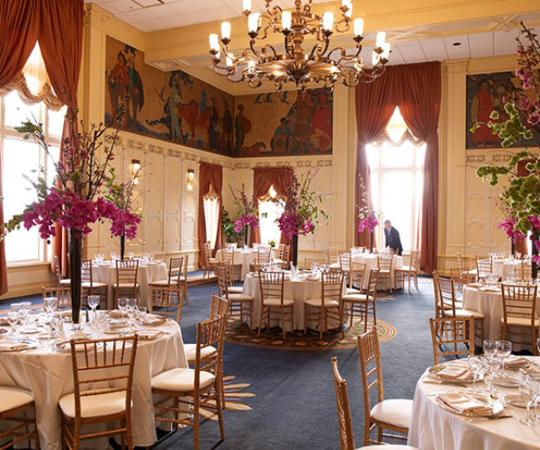 a room with tables and chairs