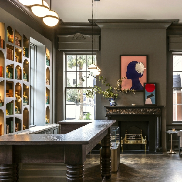 a room with a fireplace and a table