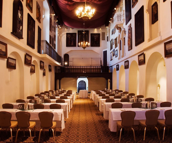 a room with tables and chairs