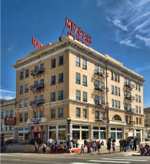 a building with people walking around
