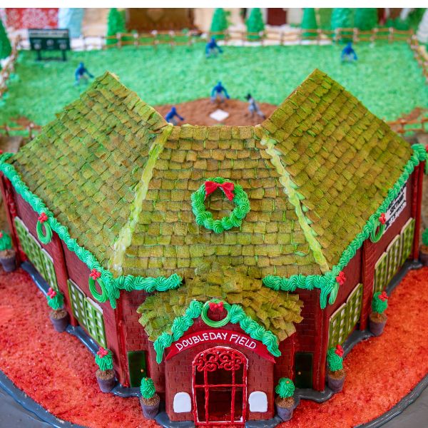 a gingerbread house with a baseball field