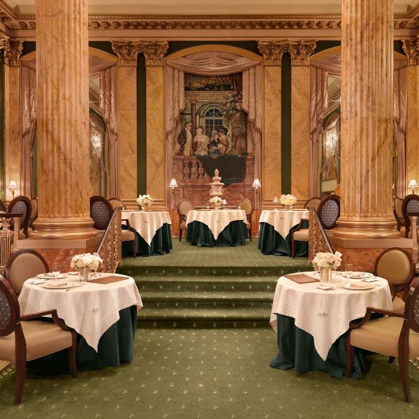 a restaurant with tables and chairs