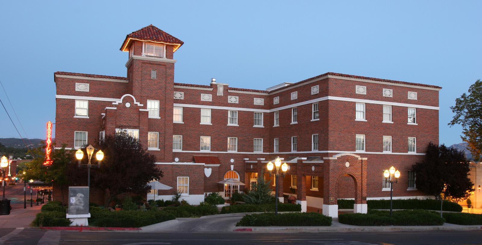 a large brick building with a tower
