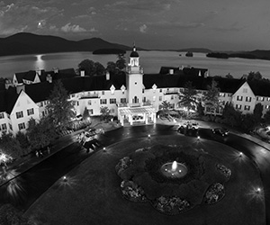 a large building with a fountain in front of it
