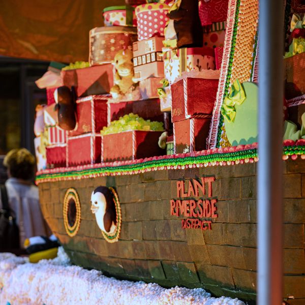 a large boat with presents on it