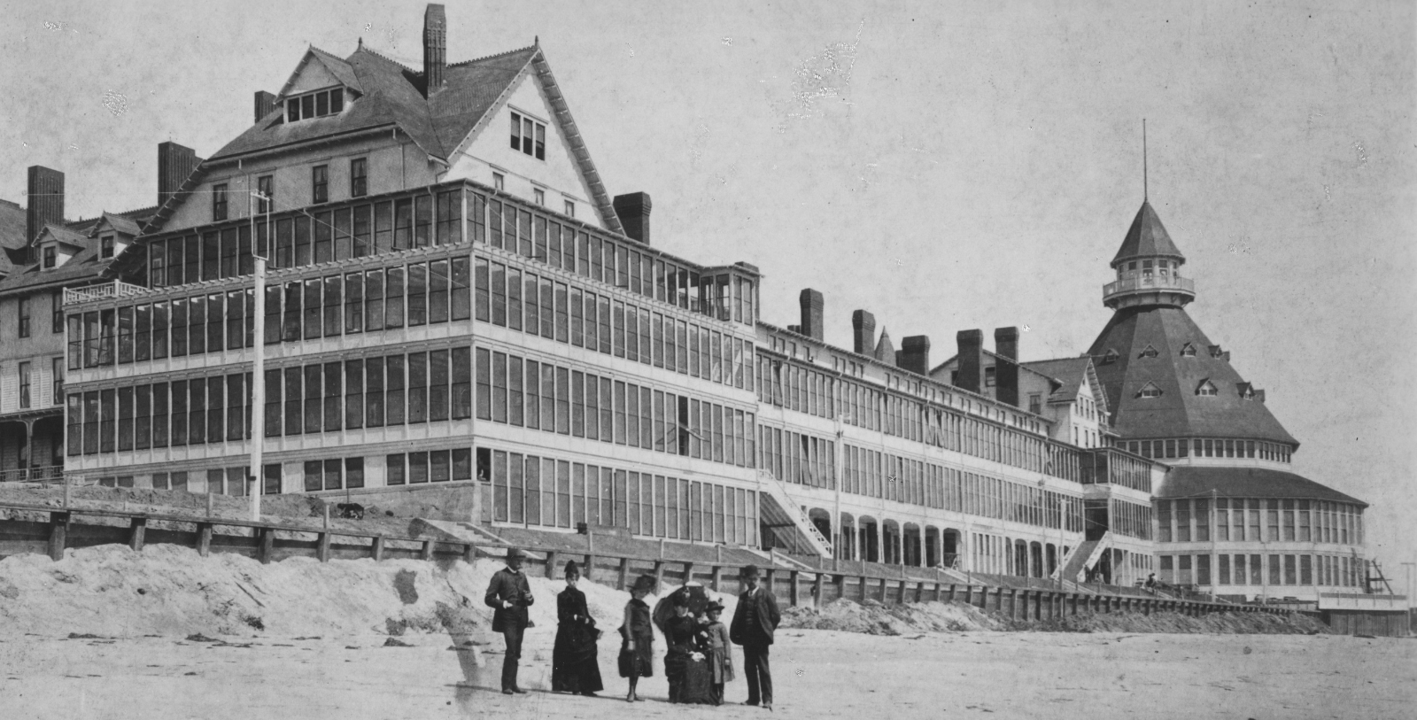 a group of people standing outside of a building
