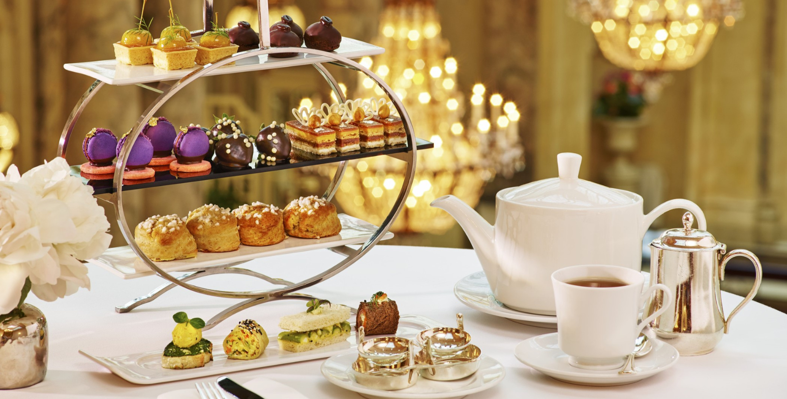 a tea set with a teapot and cup of tea