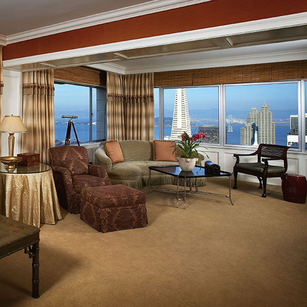 a living room with a view of a city