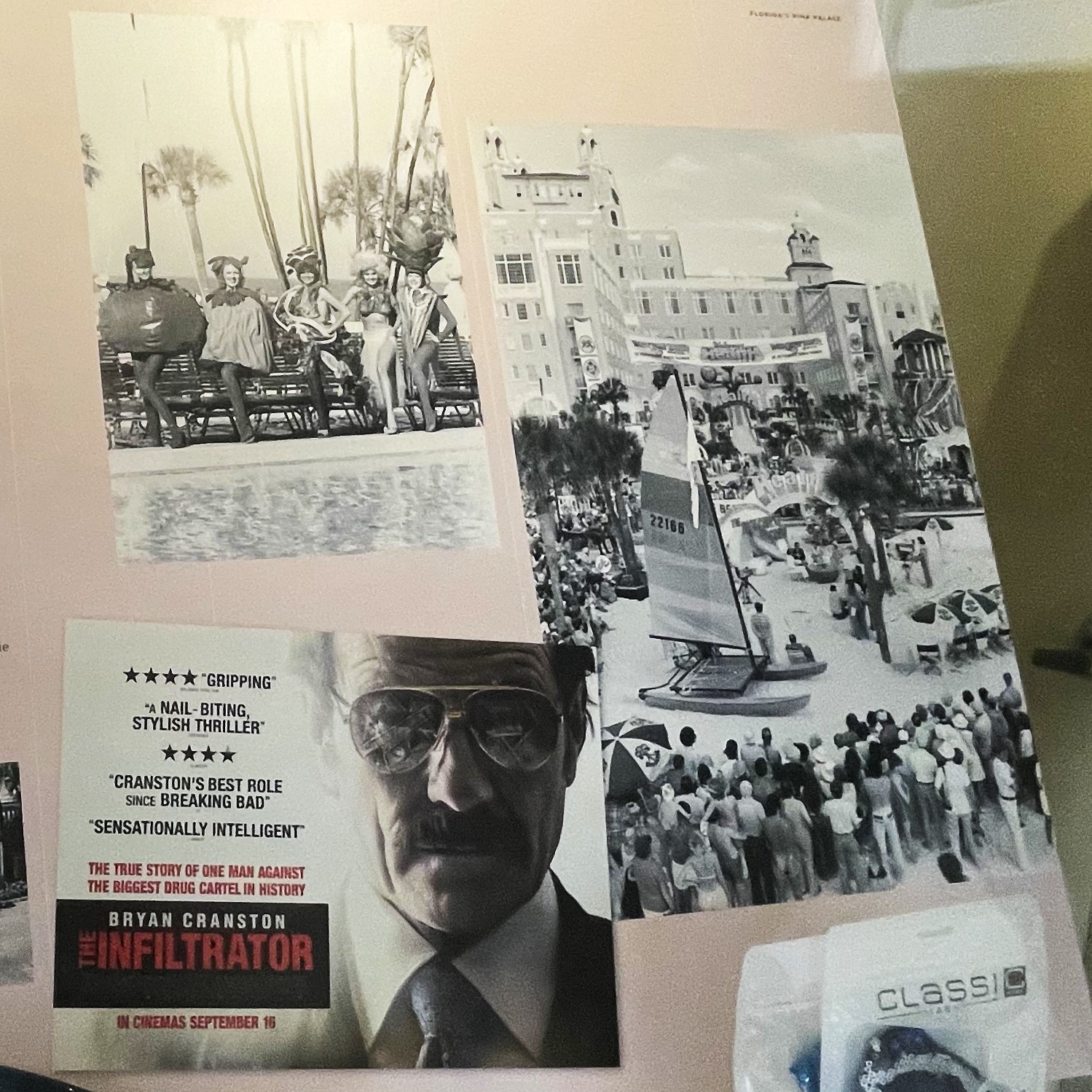 a poster with pictures of people and a boat