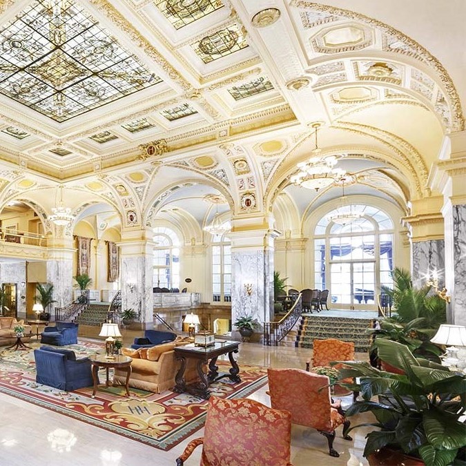 a large room with a large ceiling and a large staircase