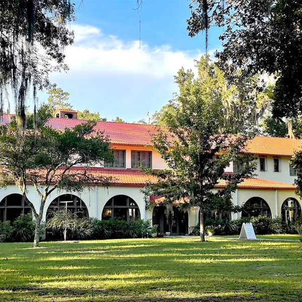 a building with trees in the background
