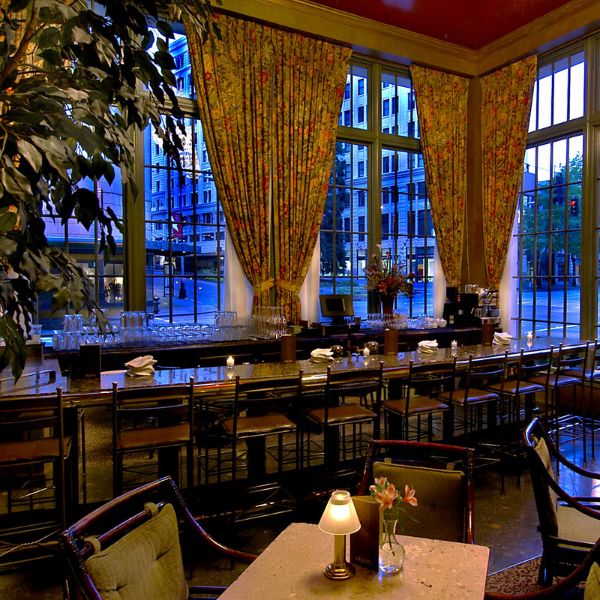 a room with tables and chairs