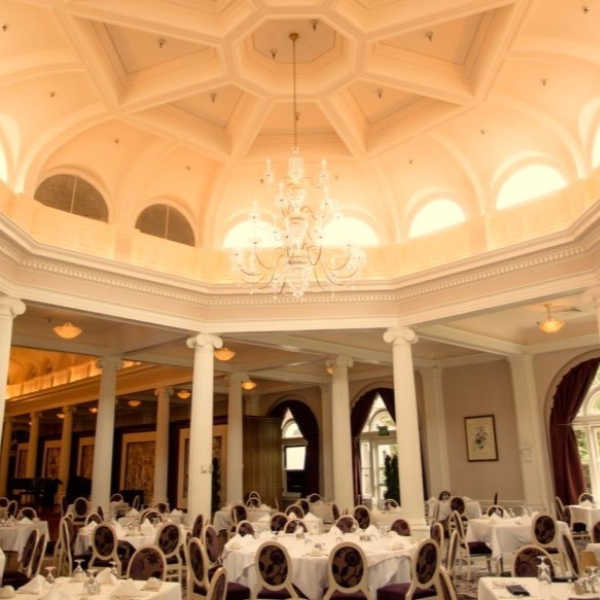 a room with tables and chairs