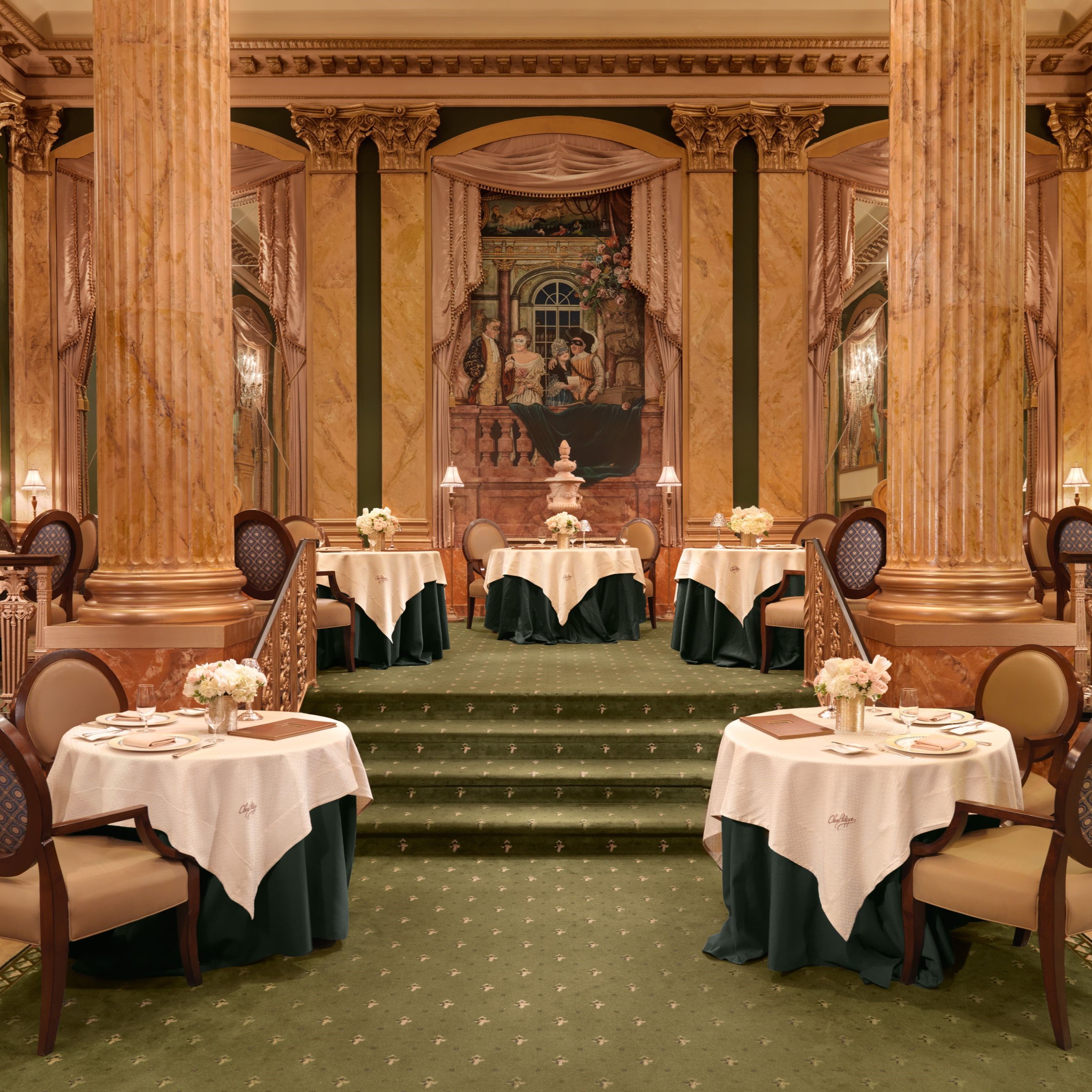 a room with tables and chairs