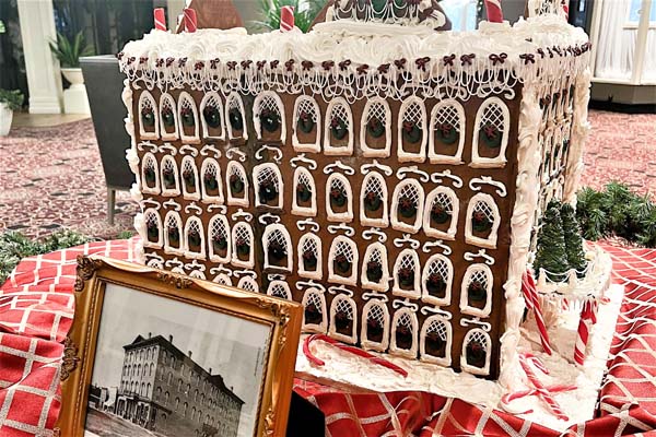 a gingerbread house with a picture frame