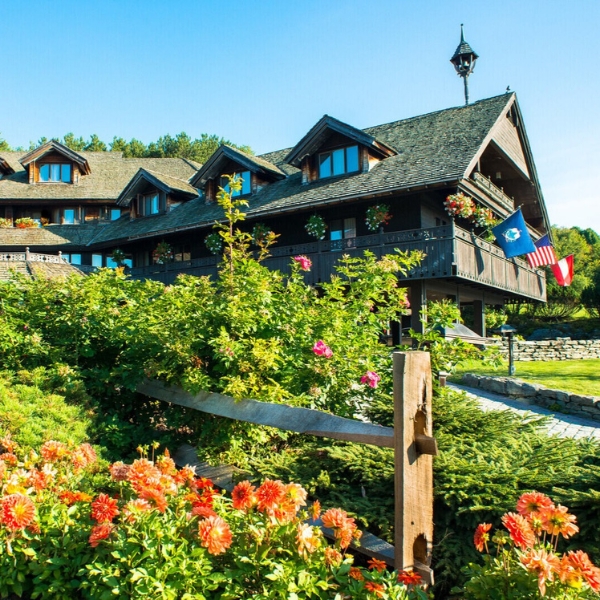 a house with a garden and flowers