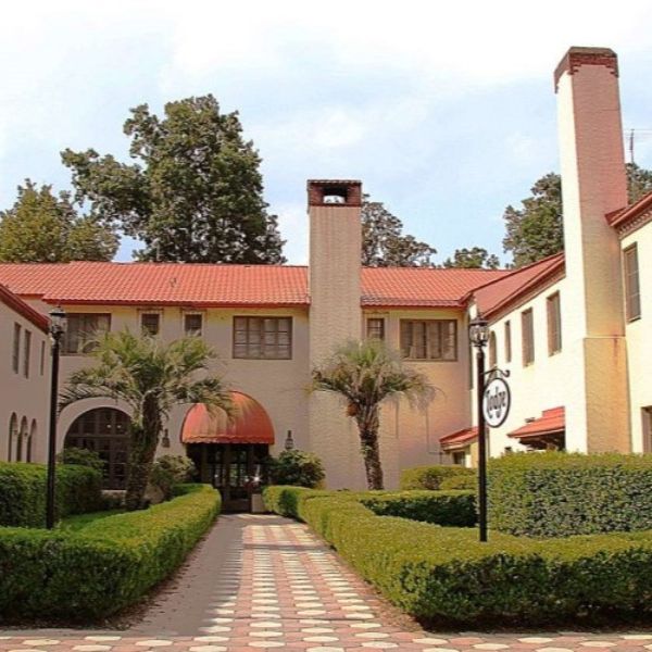 a building with a red roof and a red roof