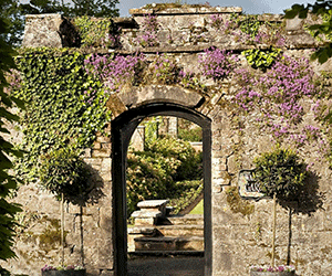 a stone wall with a doorway