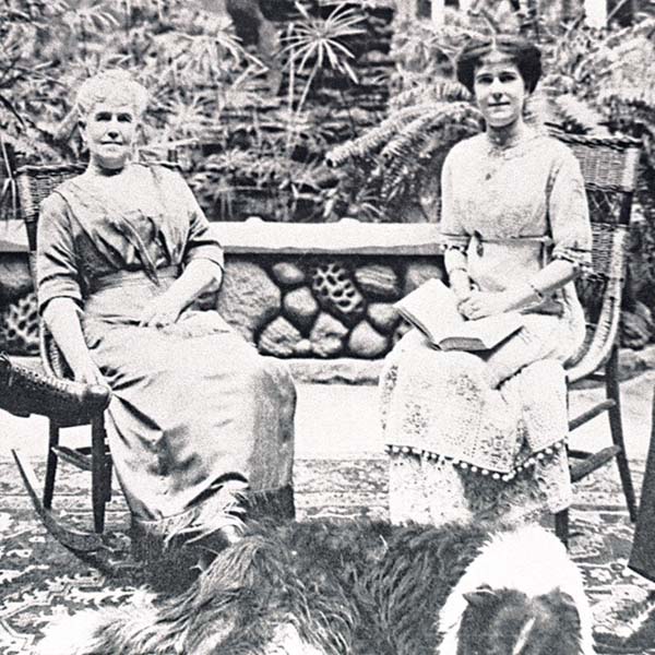a couple of women sitting in rocking chairs